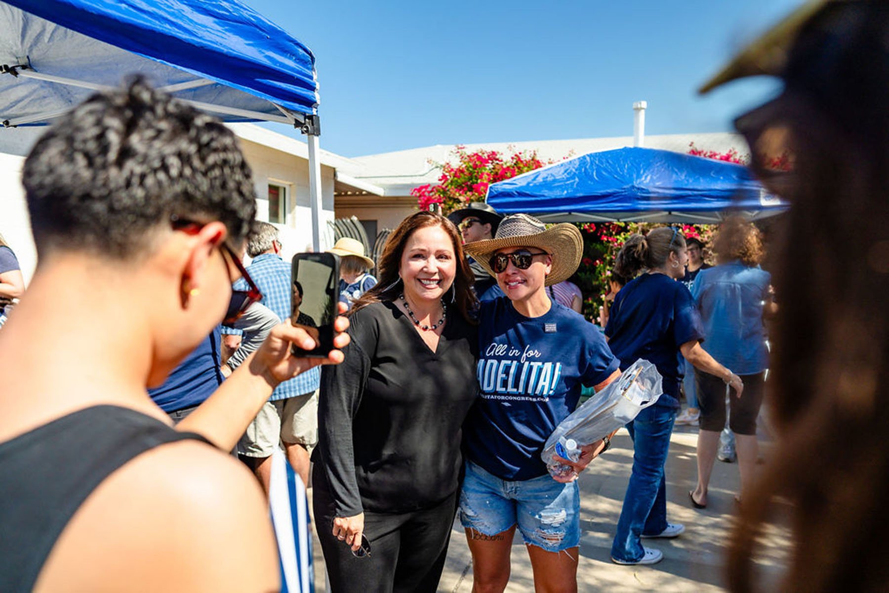 Adelita Grijalva poses with a supporter.