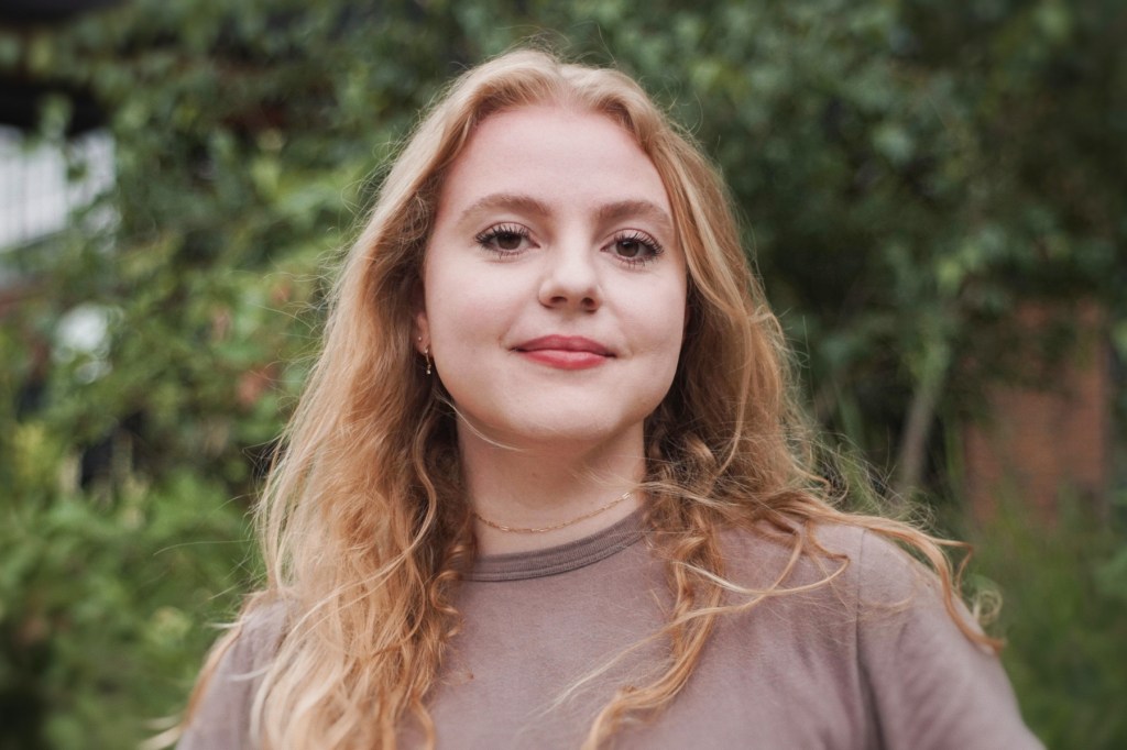 New hire announcement for The 19th's new brand designer, Sarah Porter.