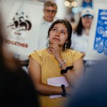 Yessenia Ruano stands amongst friends, family, and immigration supporters during a press conference at Milwaukee Mitchell International Airport before departing for El Salvador on June 17, 2025, in Milwaukee, Wisconsin.