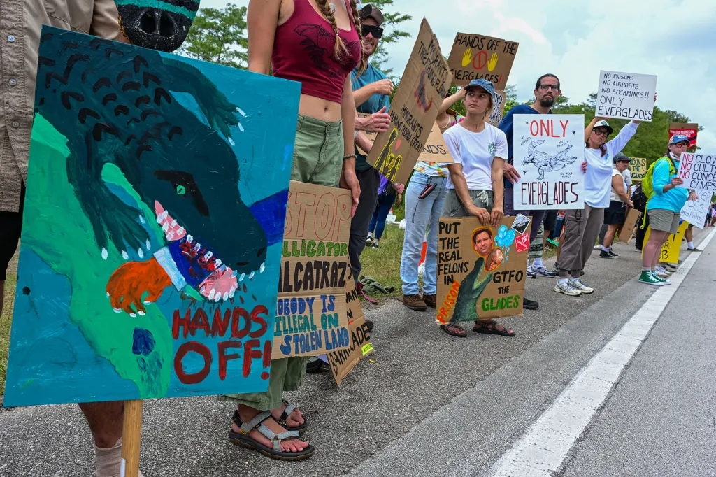 Demonstrators protest the construction of an immigrant detention center, dubbed "Alligator Alcatraz," in the Everglades near Ochopee, Florida.