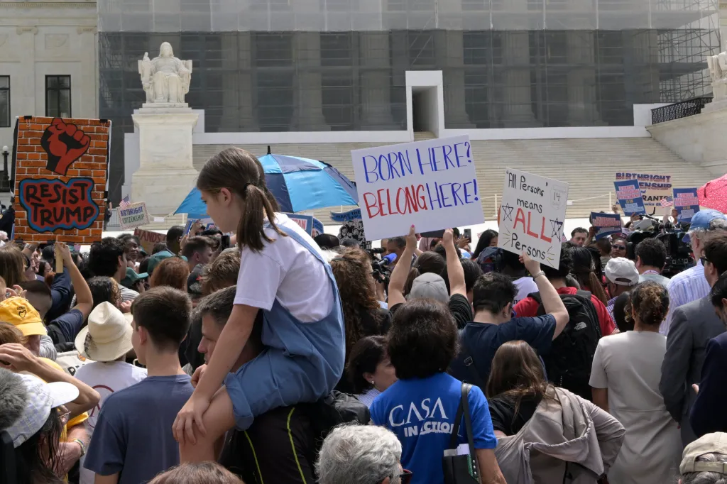 A crowd protests outside the Supreme Court.