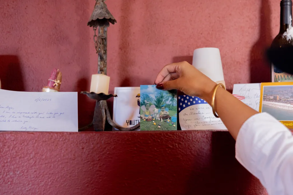 Deja Foxx reaches for mail she received from her campaign post office box.