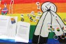 A table with a rainbow flag, buttons, stickers, papers and bracelets at the Two Spirit Conference.