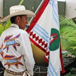 A person wears a wears a shirt he created for the Two Spirit Conference’s fashion show event.