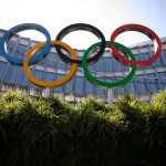 The Olympic Rings logo is pictured in front of the headquarters of the International Olympic Committee.