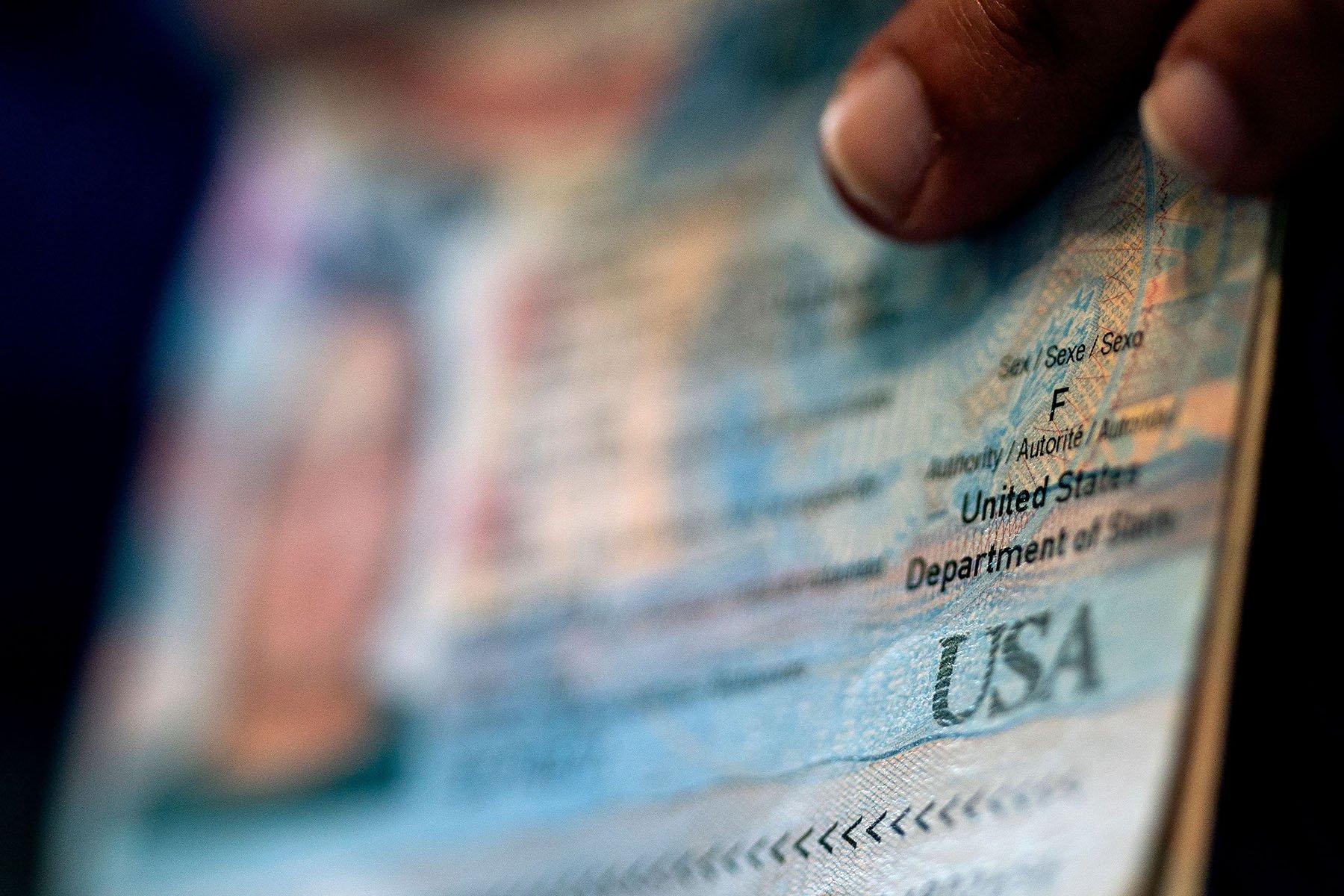 A person shows the female gender marker on their current U.S. passport.