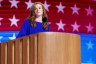 A politician stands at a podium.