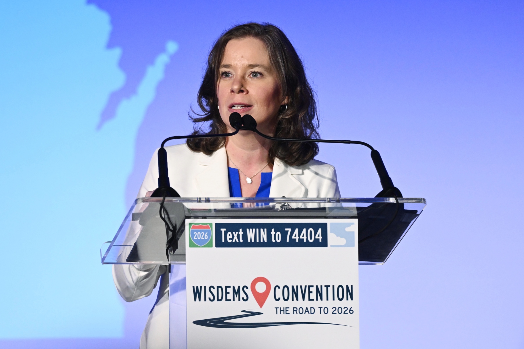 Wisconsin Lt. Gov. Sara Rodriguez speaks onstage at a podium.