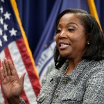Lisa Cook takes the oath of office to serve as a member of the Board of Governors at the Federal Reserve System.