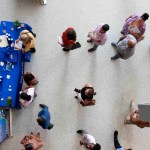 A view from above looking at lines of job seekers at a job fair.