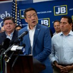 Texas House Democratic Caucus Chair Gene Wu speaks to reporters during a press conference with Texas Rep. Trey Martinez Fischer and Illinois Governor JB Pritzker.