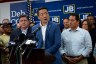 Texas House Democratic Caucus Chair Gene Wu speaks to reporters during a press conference with Texas Rep. Trey Martinez Fischer and Illinois Governor JB Pritzker.