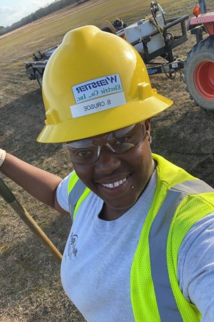 Selfie of a woman in a hard hat