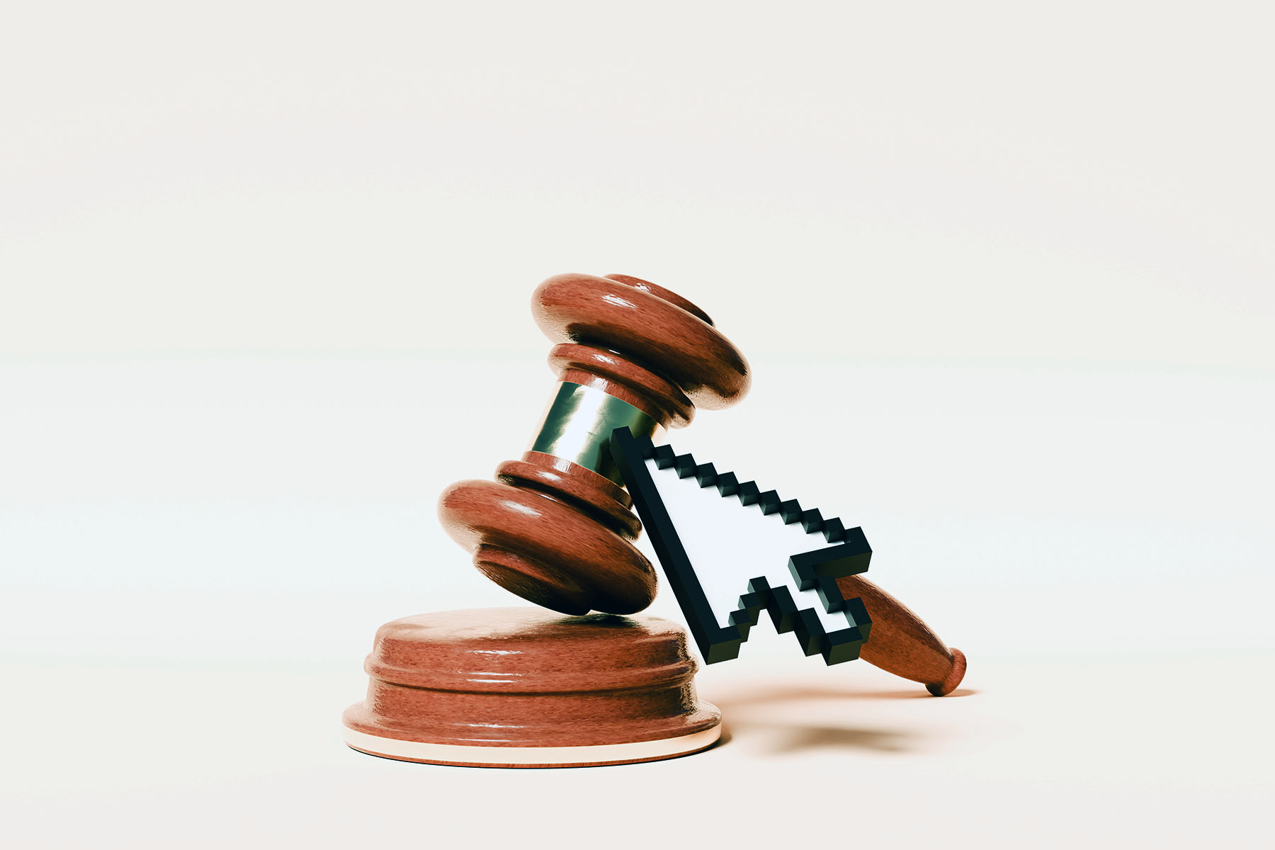 a mouse cursor hovering in front of a large gavel.