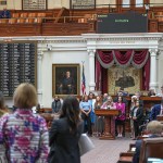 Backed by other supporters, Texas Rep. Angelia Orr reads Senate Bill 8, the bathroom bill, in the House chamber at the Texas Capitol.