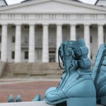 Teal shoes are displayed outside Naval Medical Center Portsmouth.